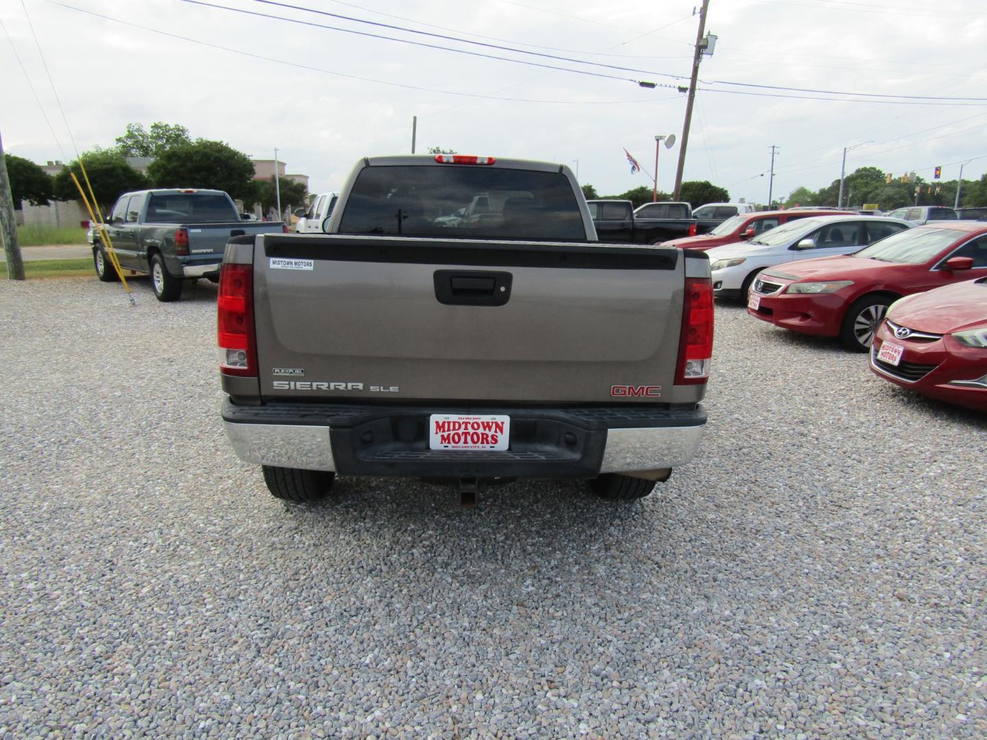 2012 Bronze /Tan GMC Sierra 1500 SLE Ext. Cab 2WD (1GTR1VE04CZ) with an 5.3L V8 OHV 16V FFV engine, Automatic transmission, located at 15016 S Hwy 231, Midland City, AL, 36350, (334) 983-3001, 31.306210, -85.495277 - Photo#6